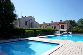 Cosy two - storey villa with a garden and a shared swimming pool Porto Santa Margherita